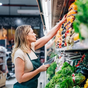 Supermarket Manager doing inventory